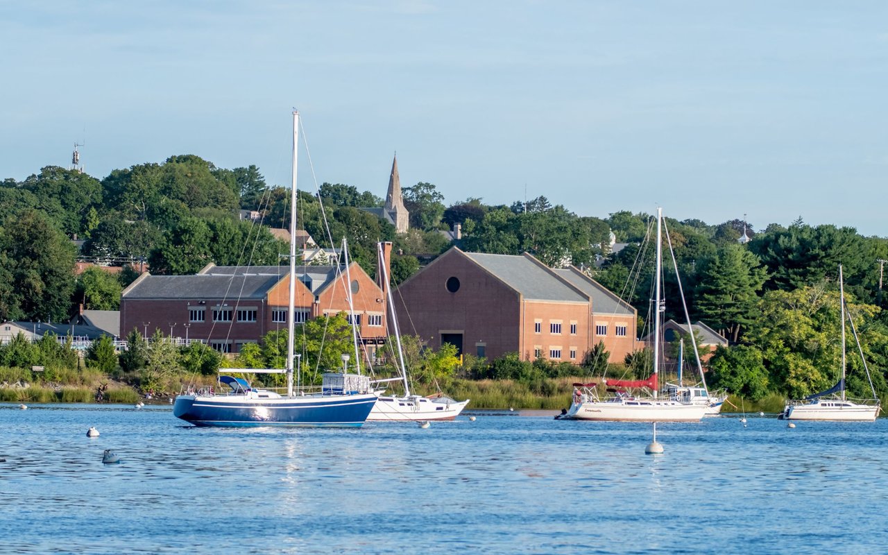 East Greenwich waterfront with sailboats, from Smith & Oak's East Greenwich guide